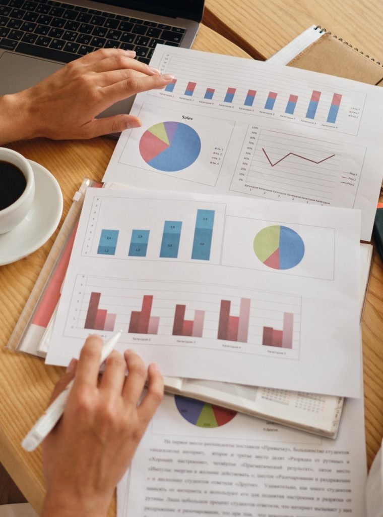 close-up-business-colleagues-working-on-new-project-with-diagrams-in-modern-office.jpg